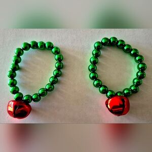 Green Beaded Bracelet with Red Charm